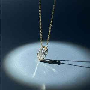 Elegant Gold and Silver Teardrop Pendant Necklace